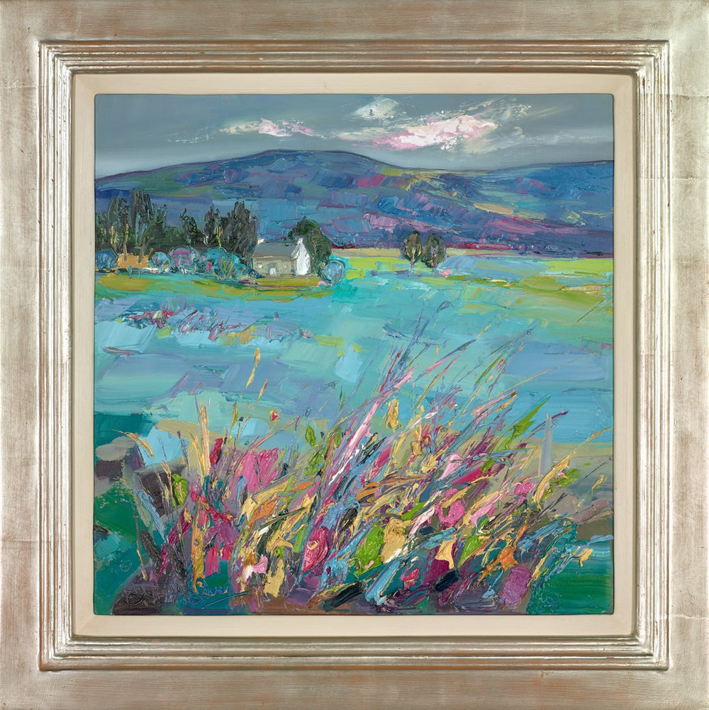 Cottage through spring grasses