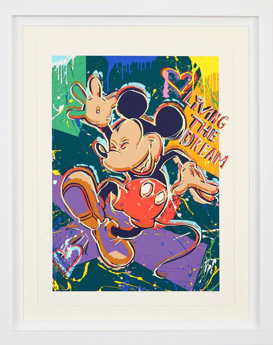Vibrant limited edition artwork by Mr. Brainwash featuring Mickey Mouse jumping joyfully against a dynamic abstract background of green, yellow, purple, and blue splashes and paint drips. A heart and the words ‘LIVING THE DREAM’ appear beside him in bold text.