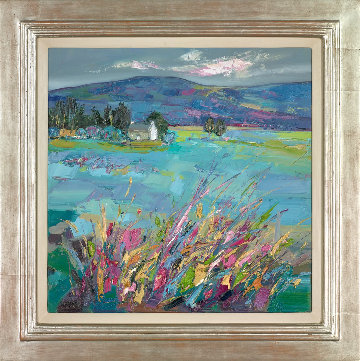 Cottage through spring grasses