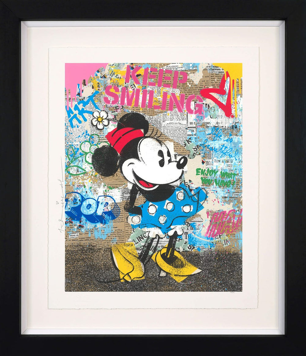 Mr Brainwash painting of Minnie Mouse wearing a blue polka dot skirt and red hat in front of a graffiti wall.

